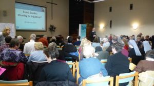 attendees at a conference organised by Joe Burns